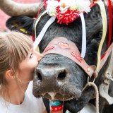 Mellissa Uttinger celebrates the victory of her cow